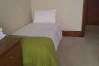 Kamar Tidur St. Itas Guesthouse