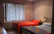 Kamar Tidur 6 Kathys Place Bed and Breakfast