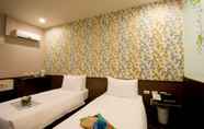 Bedroom 2 Ximen Holiday Fun Hotel