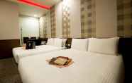 Bedroom 3 Ximen Holiday Fun Hotel