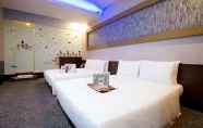 Bedroom 4 Ximen Holiday Fun Hotel