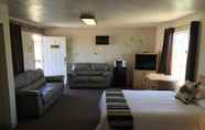 ห้องนอน 5 The Riverside Ranch RV Park, Motel & Campground