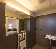 In-room Bathroom 7 Delta Hotel