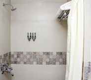 In-room Bathroom 3 Vinayaga by Poppys  Kumbakonam