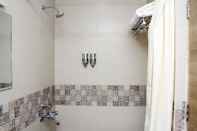 In-room Bathroom Vinayaga by Poppys  Kumbakonam