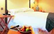 Kamar Tidur 4 Marwell Hotel