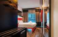 Kamar Tidur 3 Essence Hotel Carlton