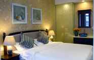 Phòng ngủ 5 Qingdao Villa Inn Seaside