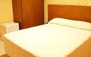 Kamar Tidur 3 Hotel Village Confort