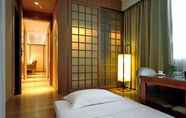 Kamar Tidur 6 Rainbird International Hotel