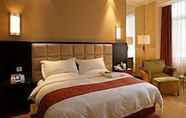 Kamar Tidur 7 Rainbird International Hotel