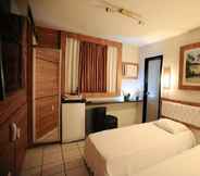 Bedroom 2 Laguna Praia Hotel