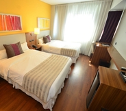 Bedroom 6 Hotel Bicentenario Suites & Spa