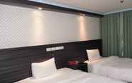 Kamar Tidur 3 Modern Plaza Hotel