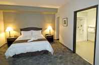 Kamar Tidur Midland Inn & Suites