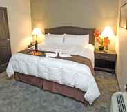 Bedroom 4 Midland Inn & Suites