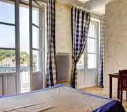 Bedroom 2 Hôtel de la tour à LIBOURNE