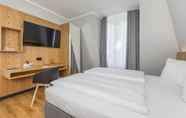 Bedroom 2 mk hotel Eschborn