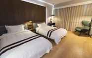Bedroom 2 Qingdao The Castle Hotel