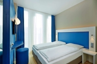 Phòng ngủ H2 Hotel München Messe