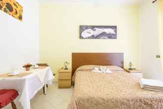 Bilik Tidur 4 B&B Soggiorno di Ostia