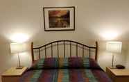 Kamar Tidur 6 The Hitching Post Motel