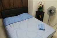 Bedroom Putra Place Home Inn