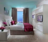 Bedroom 2 Ramada Hotel and Suites by Wyndham Dubai JBR