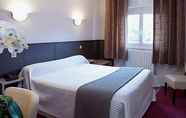 Kamar Tidur 7 Hôtel CARRER Le Rhien