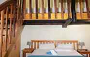 Kamar Tidur 7 Sand River Resort