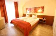 Kamar Tidur 6 Arador-City Hotel