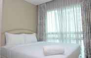 Kamar Tidur 5 Warm and Cozy 2BR Apartment Woodland Park Residence