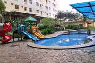 Swimming Pool Cozy and Minimalist Kebagusan City 2BR Apartment