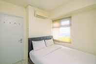 ห้องนอน Comfort Green Pramuka 2BR Apartment