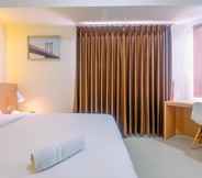 Bedroom 2 Comfort 1BR Apartment at Mustika Golf Residences