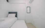 Bedroom 2 Clean and Simply Cozy 2BR Bassura City Apartment