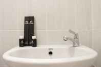 In-room Bathroom Zest Studio Semi Apartment at The Lodge Paskal near BINUS University