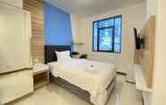 Bedroom 6 Simply Studio Room Semi Apartment at The Lodge Paskal near BINUS University