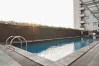 Swimming Pool Cozy and Homey Studio at Belmont Apartment