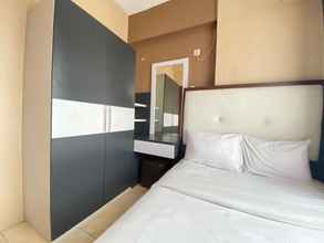 Kamar Tidur 4 Comfy & Well Appointed 2BR at Tamansari Panoramic Apartment