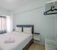 Bedroom 2 Cozy Stay 2BR Tamansari Mahogany Apartment