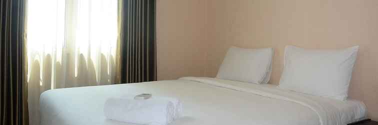 ห้องนอน Simple and Comfortable 2BR at City Home MOI Apartment