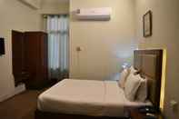 Kamar Tidur Pearl City Hotel