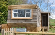 Exterior 2 Cosy and Rural Lodge at Goldhill Glamping