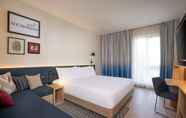 Bedroom 4 Hampton by Hilton Tashkent