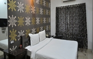 Phòng ngủ 3 Medhavi Ryan Resort
