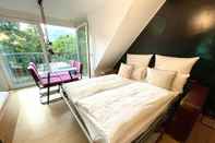 Kamar Tidur Boutique Apartment Petite Belle