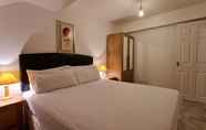 Bedroom 6 Grace Apartments - Living Stream 1