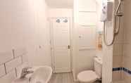 In-room Bathroom 7 Grace Apartments - Living Stream 1