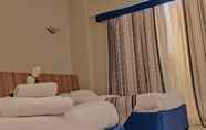 Bedroom 6 Siesta Hotel